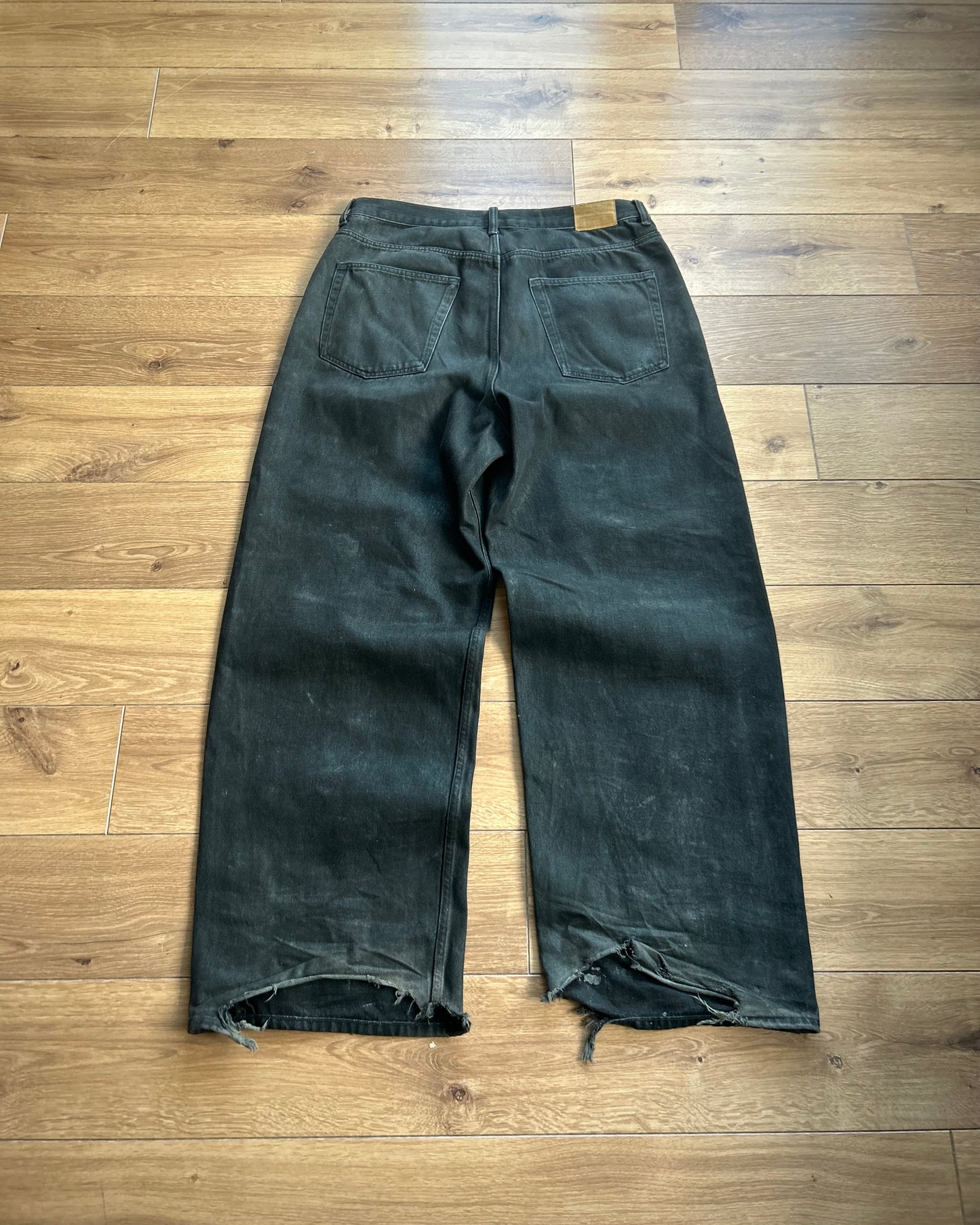 ridelucci super wide leg black waxed denim. 100% cotton.