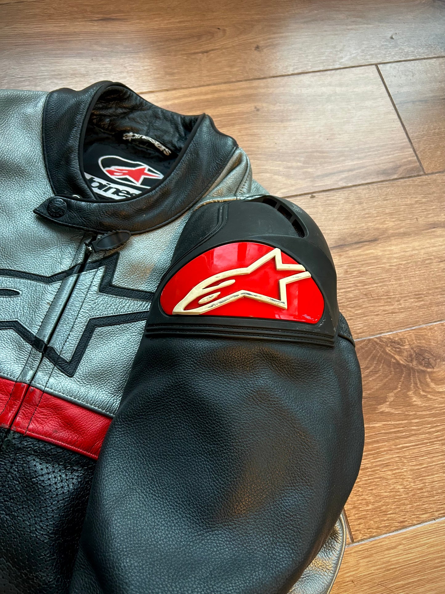 alpinestars black, silver, red leather biker jacket (M).